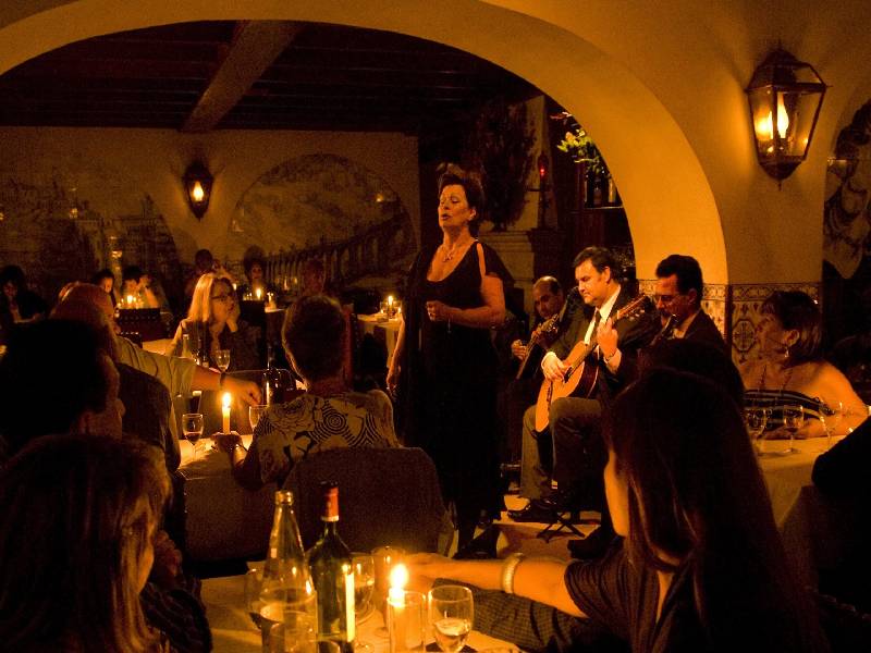 Enjoy Port wine tasting in Porto and a live Fado dinner in Lisbon