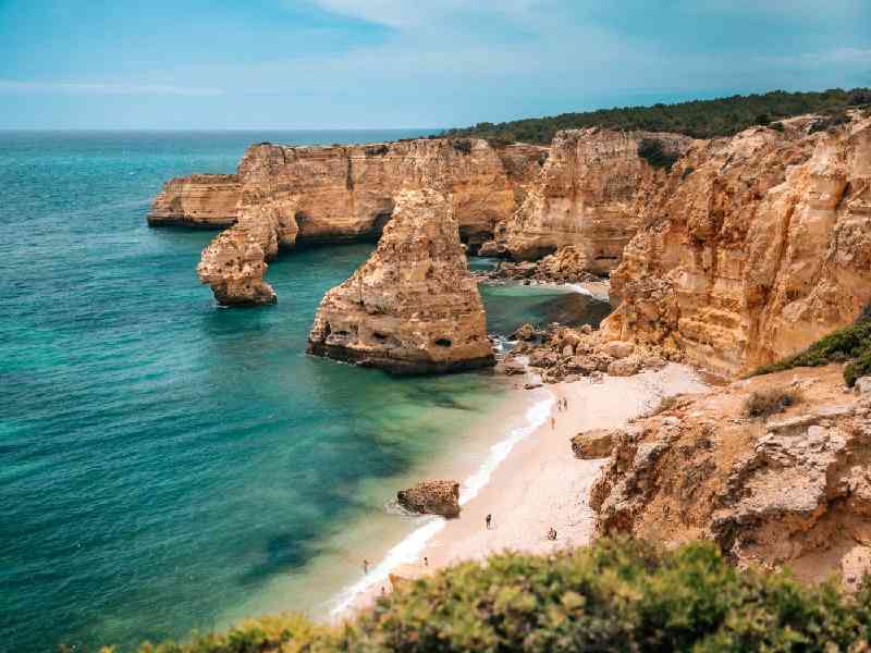 Explore breathtaking coastal scenery with Algarve beaches, hidden sea caves, dramatic cliffs, and scenic boat cruises.