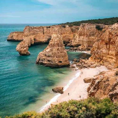 Explore breathtaking coastal scenery with Algarve beaches, hidden sea caves, dramatic cliffs, and scenic boat cruises. Explore breathtaking coastal scenery with Algarve beaches, hidden sea caves, dramatic cliffs, and scenic boat cruises.