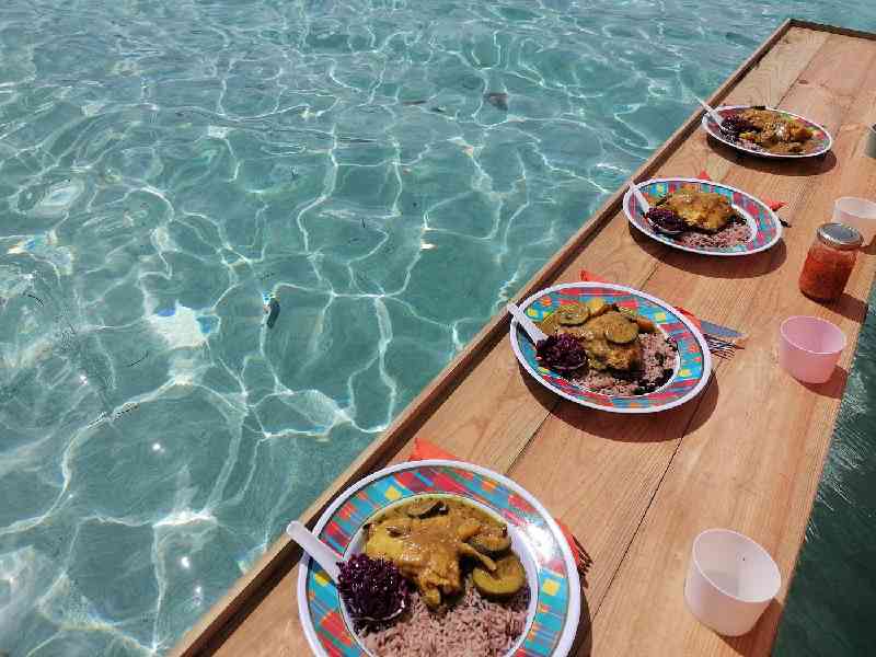 Dine and drink on a floating bar in the middle of the lagoon