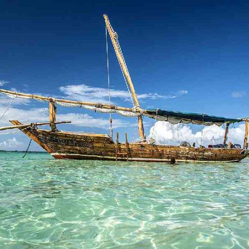 Enjoy a spectacular sundowner cruise on a dhow boat in Zanzibar Enjoy a spectacular sundowner cruise on a dhow boat in Zanzibar