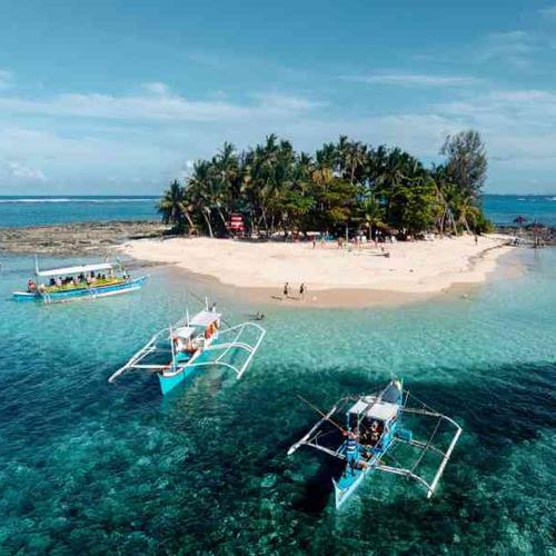 Surf, relax, and soak up the island life in Siargao, one of the world’s top surf spots. Surf, relax, and soak up the island life in Siargao, one of the world’s top surf spots.