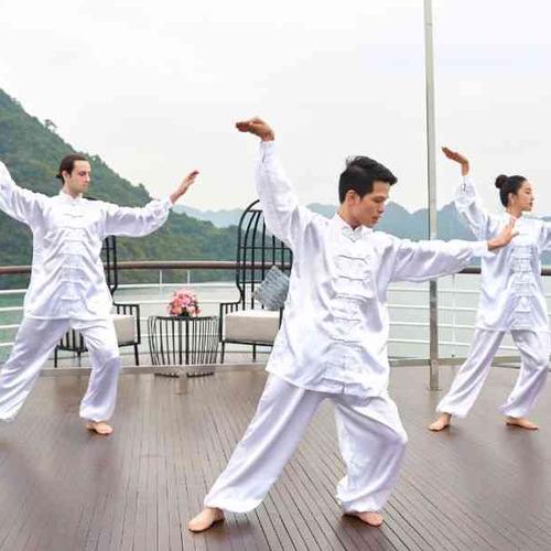 Sleep aboard a luxury junk boat and rise with the sun for tai chi on deck Sleep aboard a luxury junk boat and rise with the sun for tai chi on deck