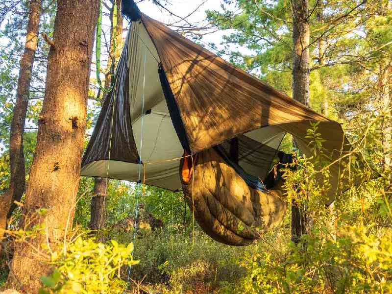 Sleep in a jungle tree-tent at the mouth of a private cenote