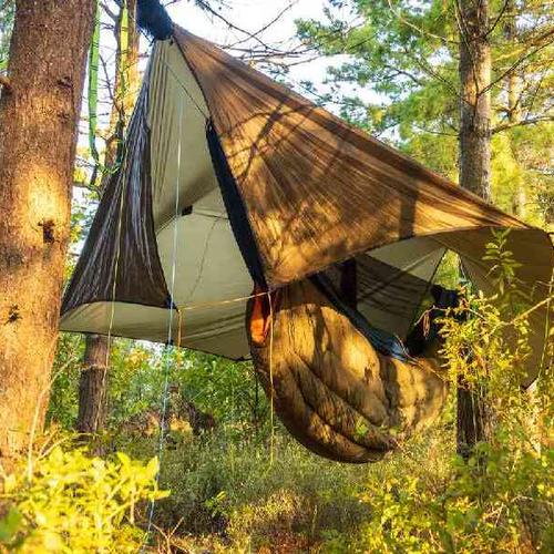 Sleep in a jungle tree-tent at the mouth of a private cenote Sleep in a jungle tree-tent at the mouth of a private cenote