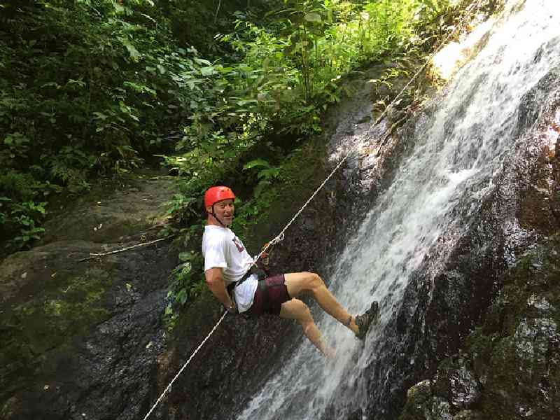 Rappell down waterfalls and rock-faced canyon walls in the heart of the jungle