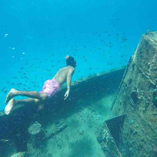 Snorkel in crystal-clear waters, explore a shipwreck, and swim alongside vibrant tropical marine life. Snorkel in crystal-clear waters, explore a shipwreck, and swim alongside vibrant tropical marine life.