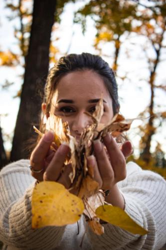 Girl holding Leaves 