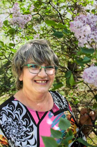 Women with glasses smiling 