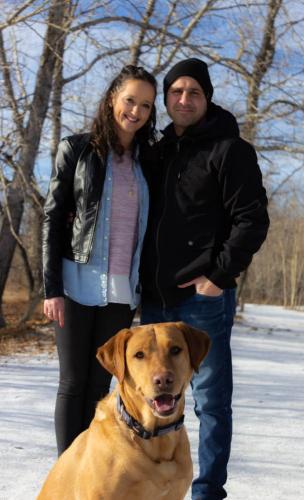 couple and dog