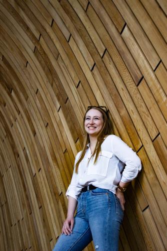 Woman with Wood Backdrop