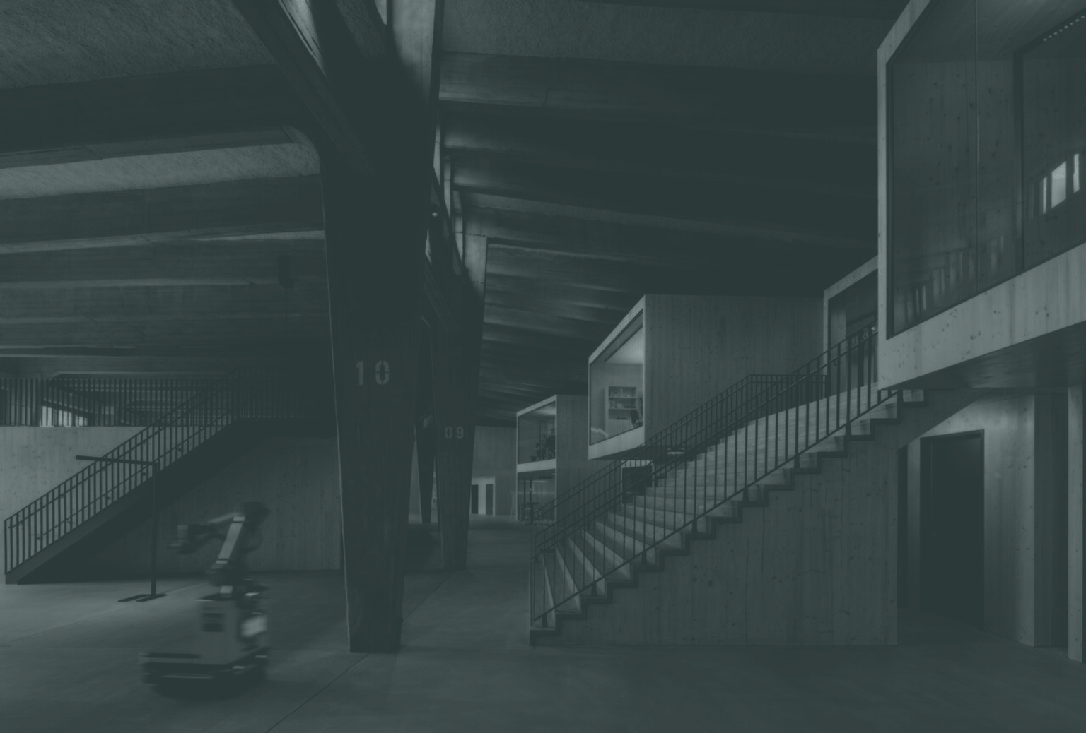 Foto von den Räumen von tdlc im Coppenrath Innovation Centre mit einer Treppe und einem Roboter.