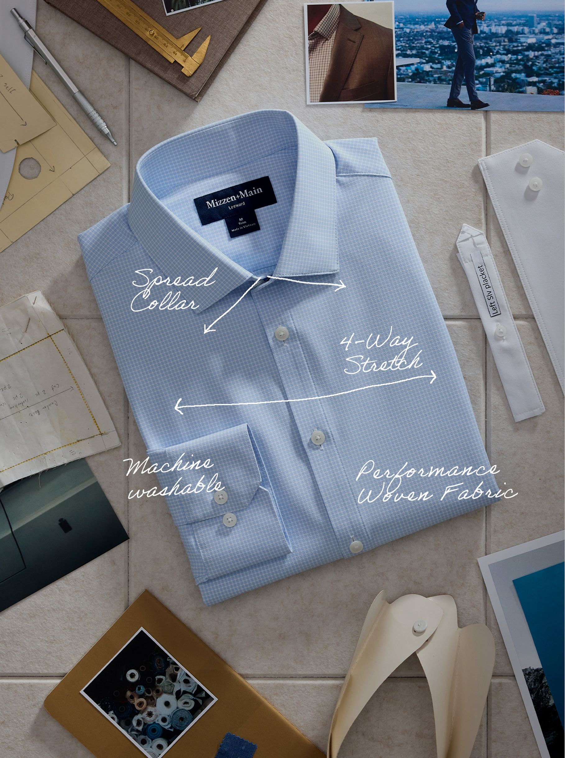 A top-down product flat-lay of a light blue grid dress shirt surrounded by design sketches and photo swatches, with annotations pointing out features like Spread Collar, 4-Way Stretch, Machine Washable, and Performance Woven Fabric.