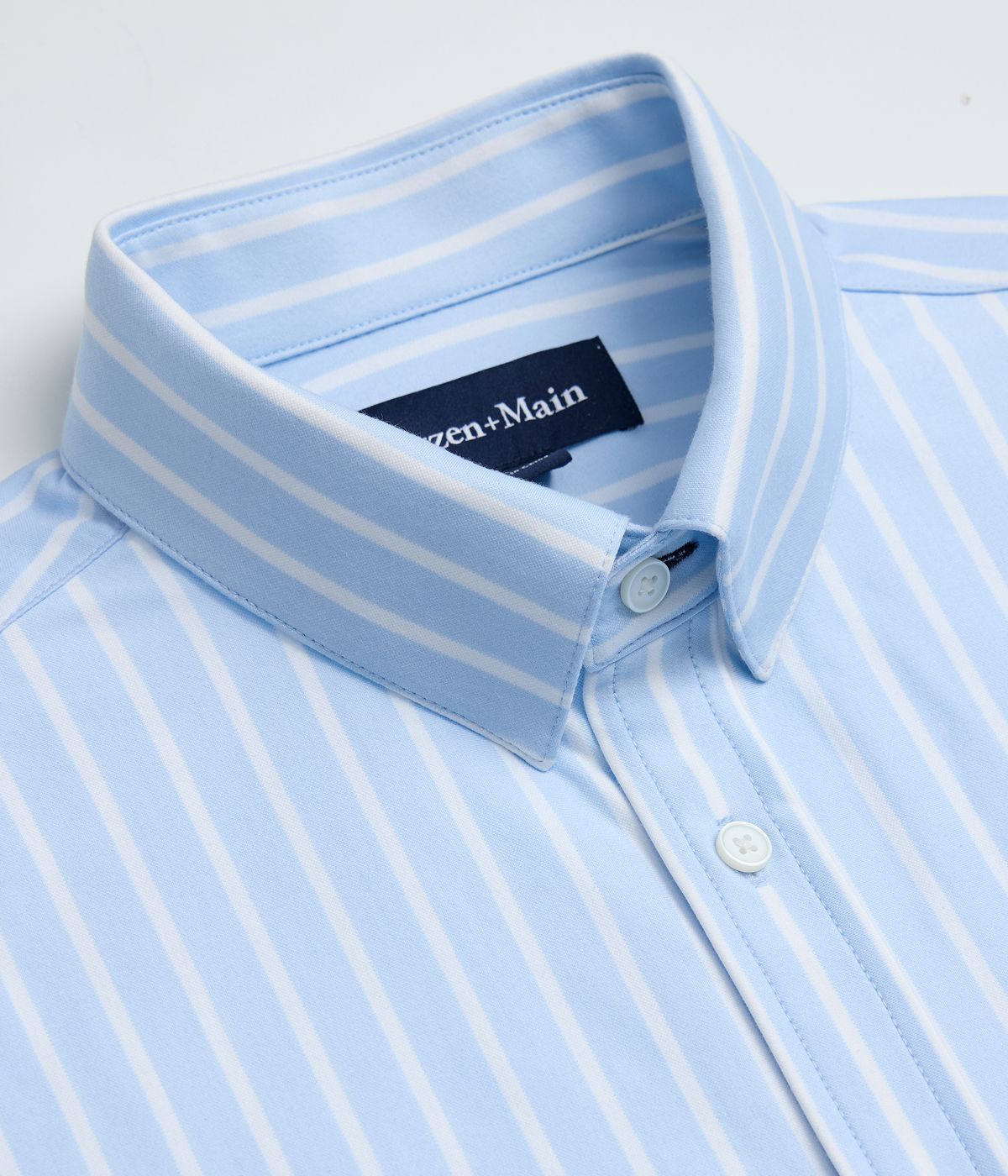 Folded blue and white striped Newport dress shirt.