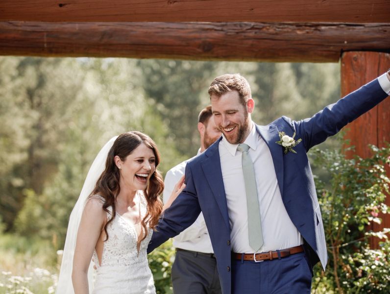 Bride and groom having fun on the big day