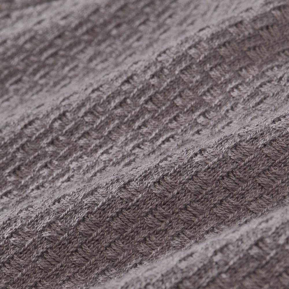 Close-up of the Hillcrest sweater's textured taupe knit fabric