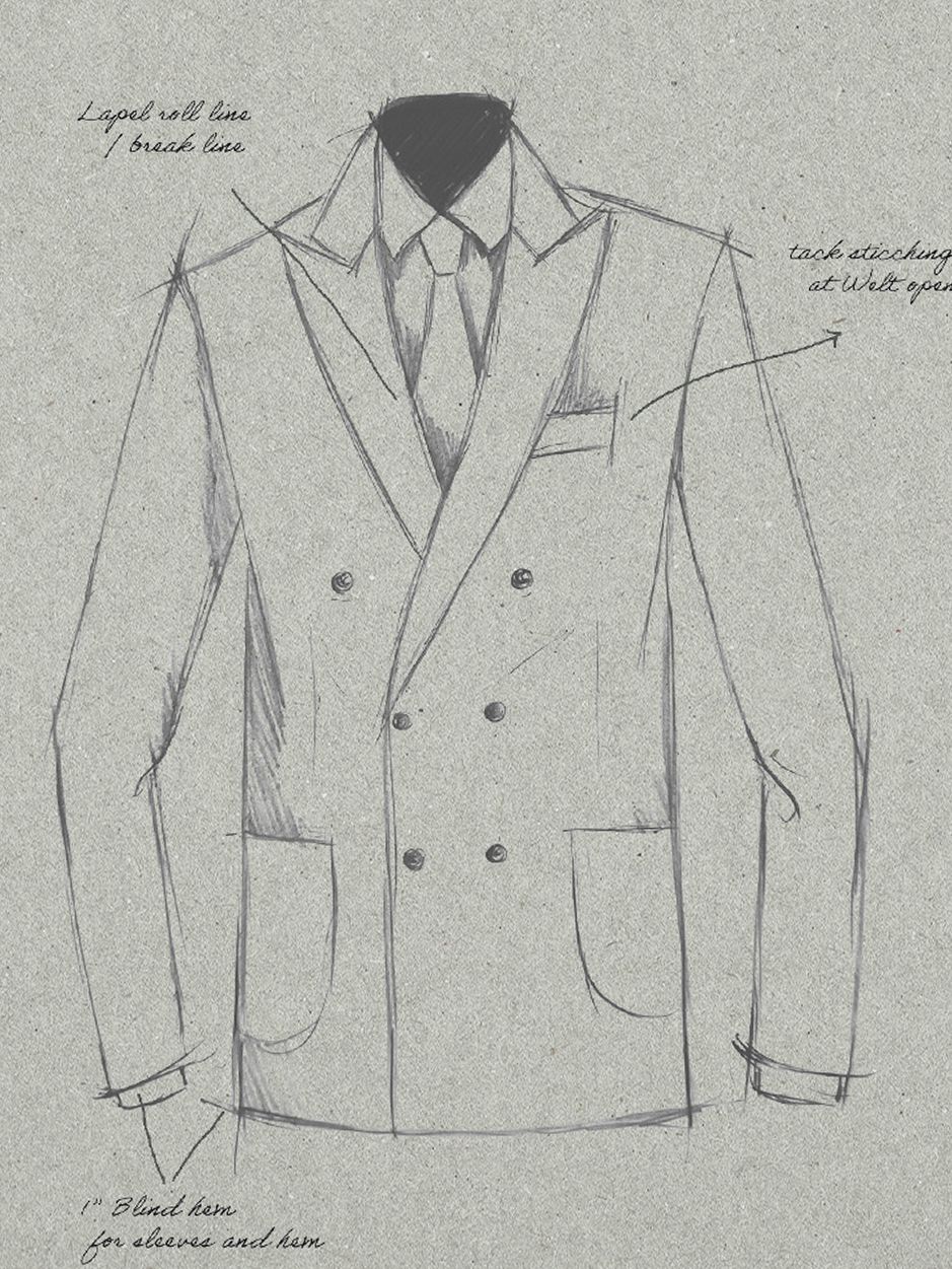 Pencil design sketch of a double-breasted suit jacket on textured paper with handwritten specifications for lapel lines, welt openings, and blind hems.