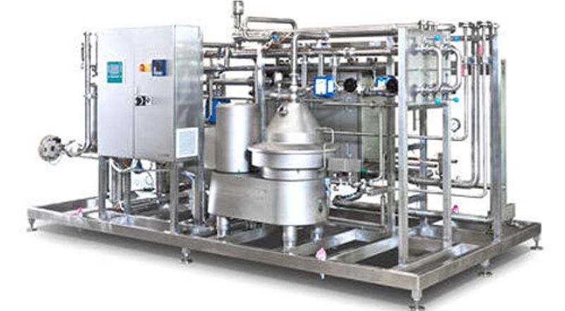 modern milk processing plant in India with stainless steel dairy machinery and pasteurization line