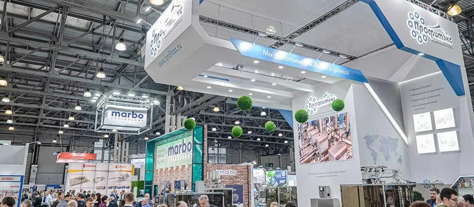 dairy machinery manufacturers showcasing equipment at dairy industry exhibition