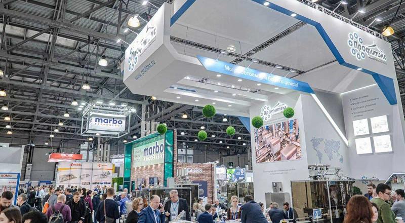 dairy machinery manufacturers showcasing equipment at dairy industry exhibition
