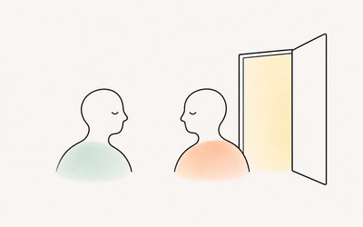 Two people face each other beside an open door, illustrating how freedom to leave can make connection feel more manageable.