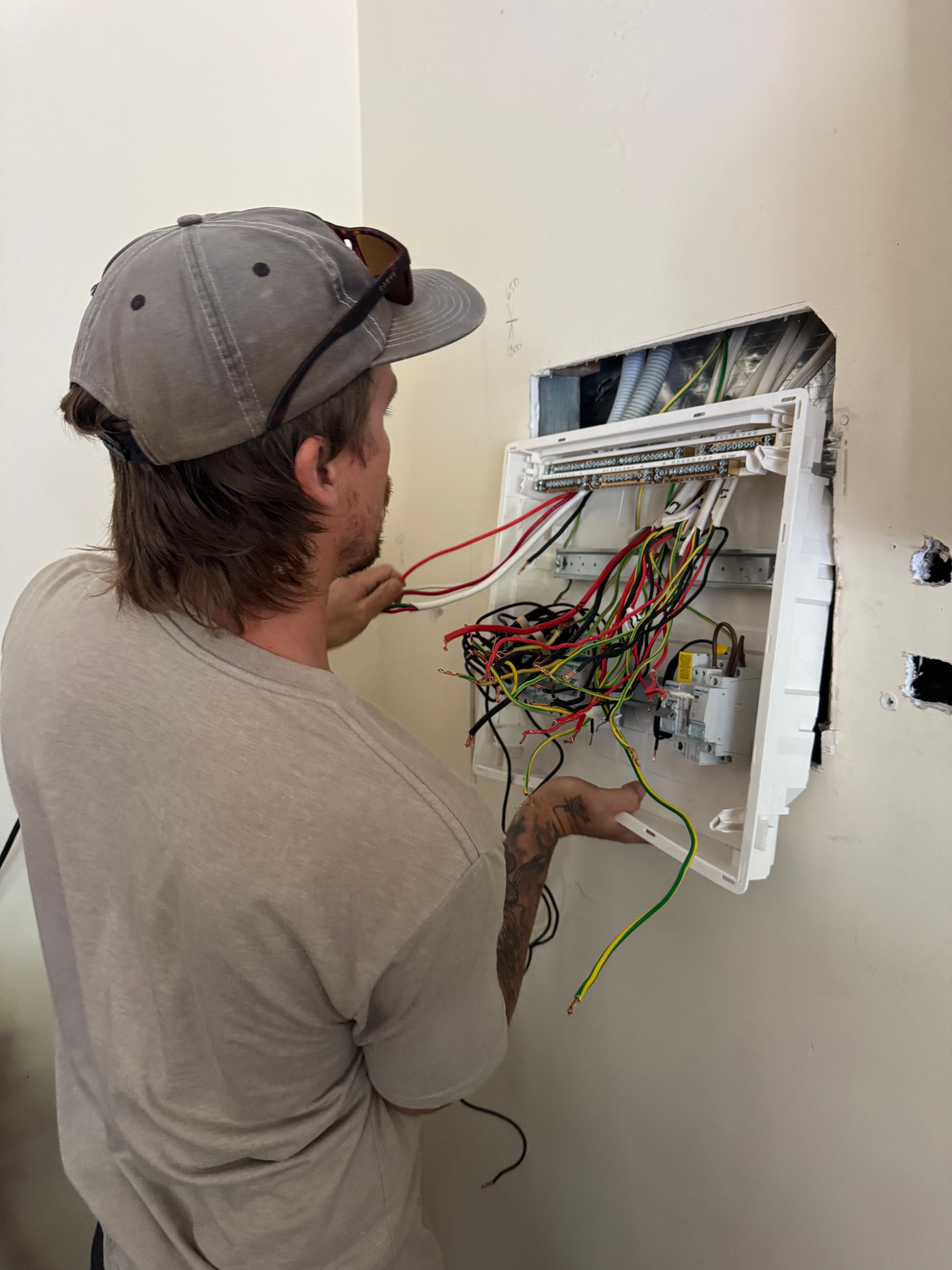 During the installation on a flush mount sub-board.