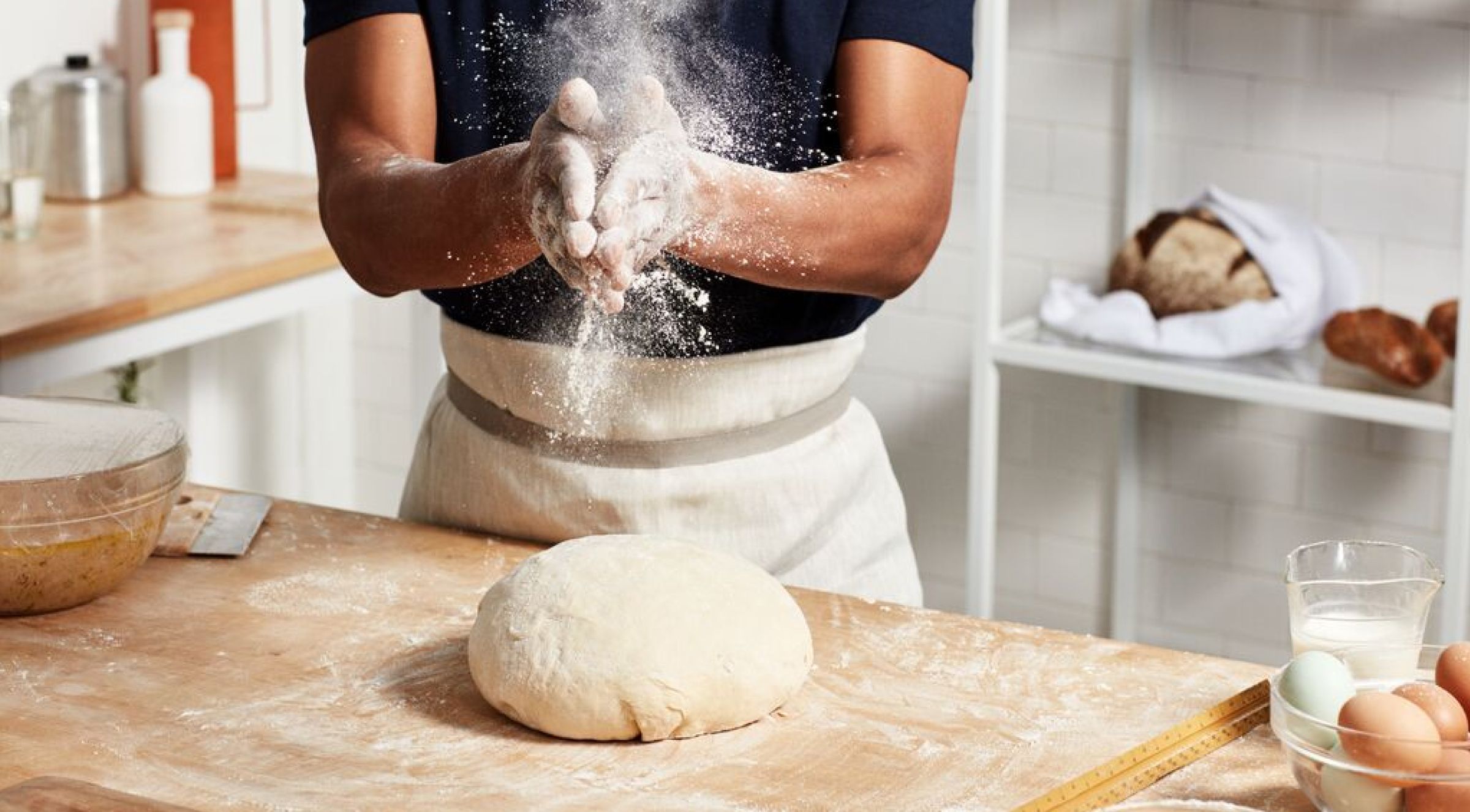 Image of baker making bread