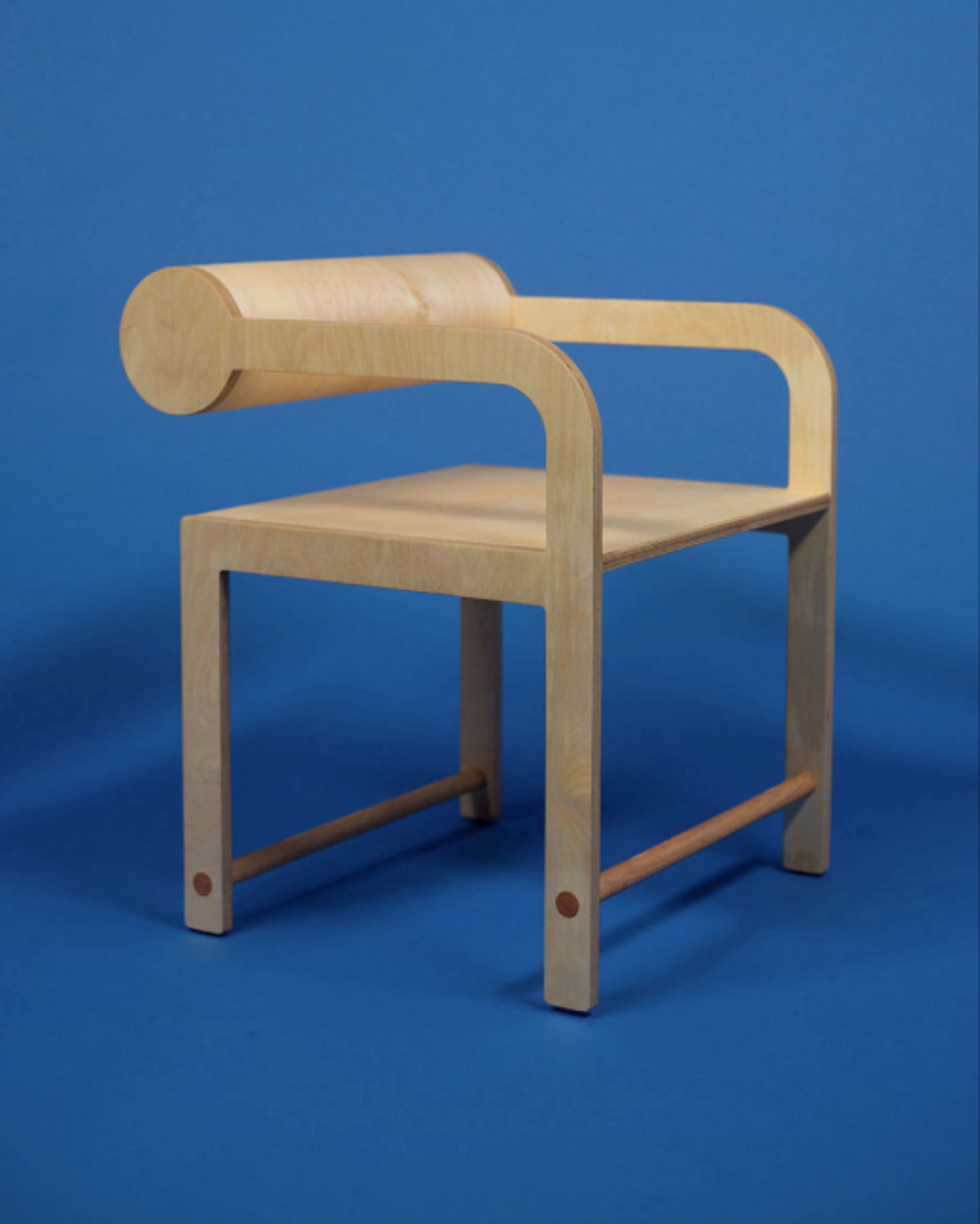 A chair designed by LA furniture studio Waka Waka on a blue background