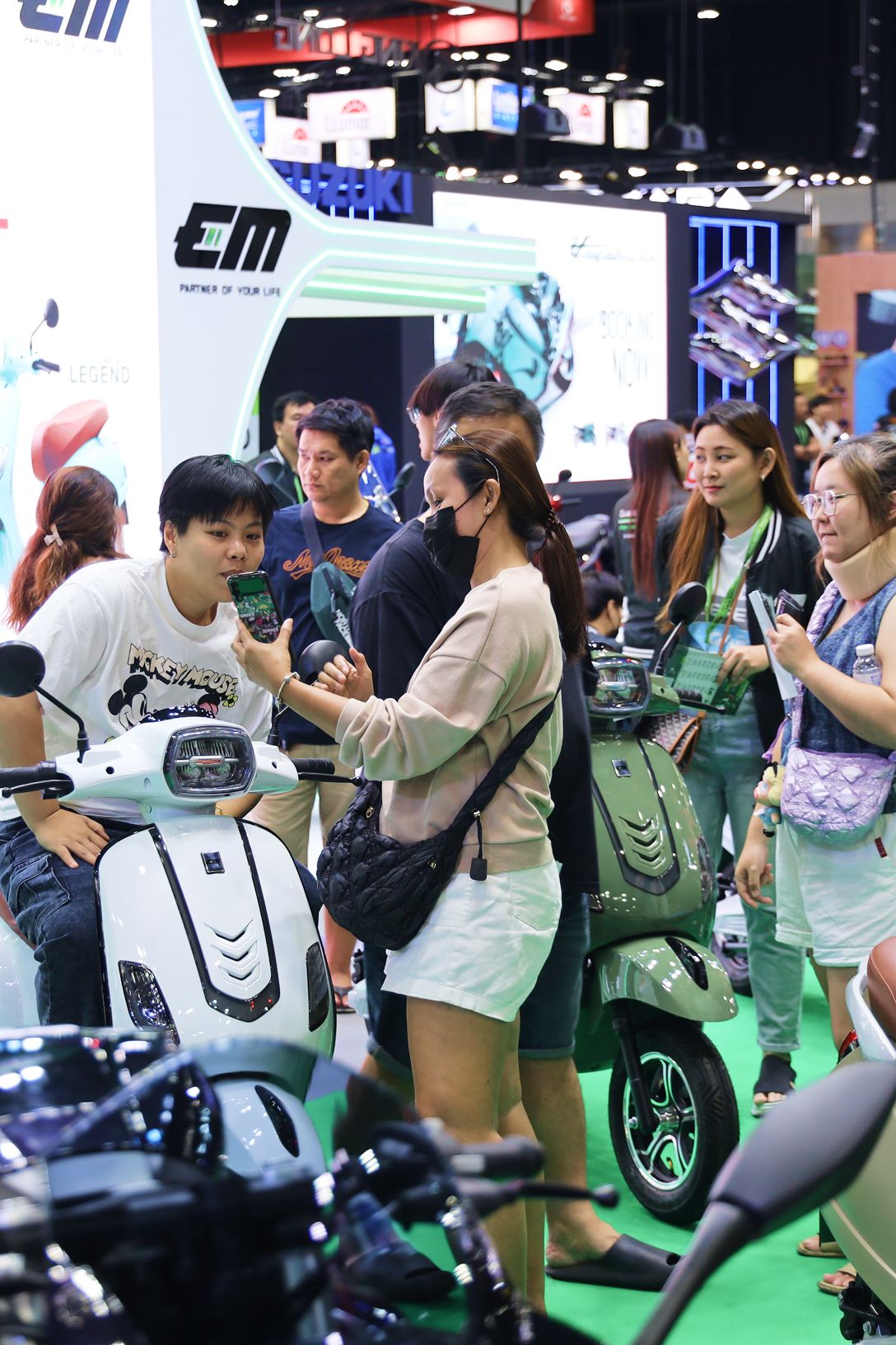 The electric vehicle market is growing exponentially. The image showing lot of buyer interesting to purchase E-Moto with EM Motor