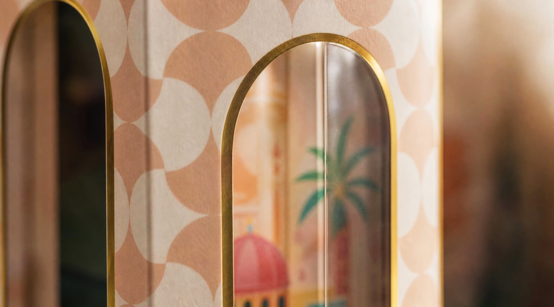 Arched package window revealing the stacked drawer architecture