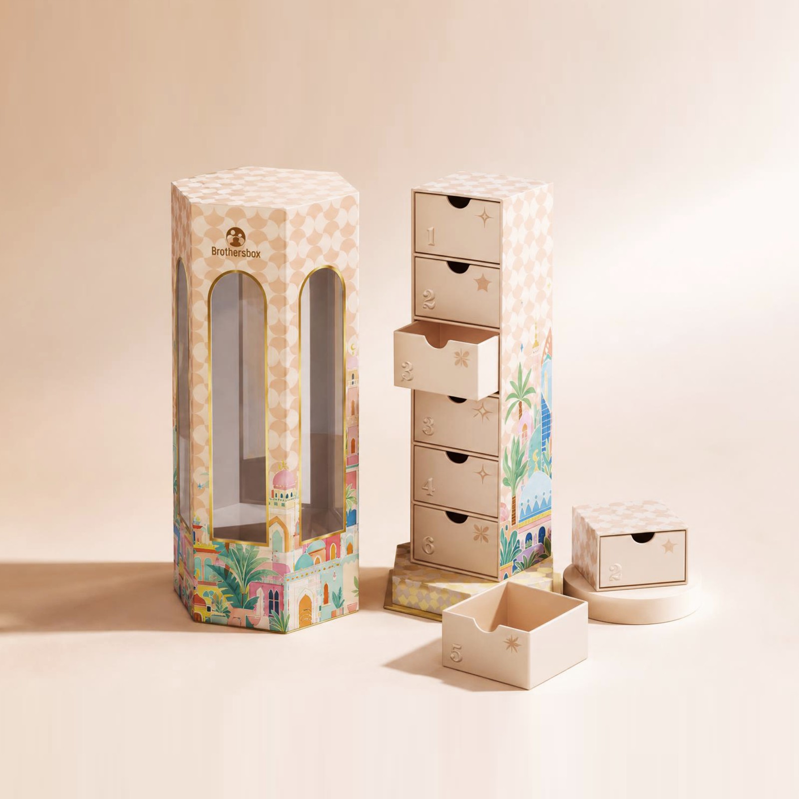 Ramadan gift box shown in multiple configurations, including the enclosed tower, open drawer tower and separate drawer components