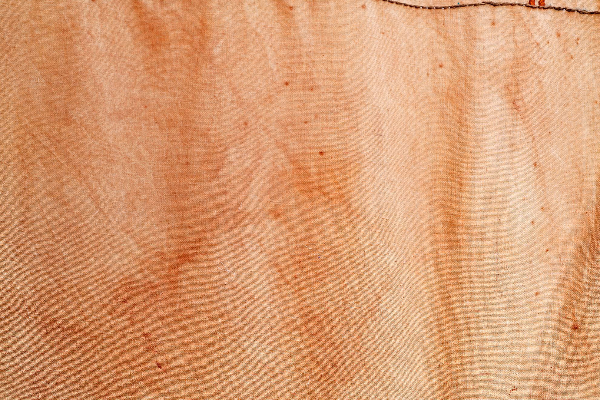 Quishile Charan, Burning Ganna Khet (Burning Sugarcane Farm), 2021, 153cm by 152cm, close up of avocado natural dye detail. Technique: hand dyed textile, embroidery thread, cotton, hessian sacks. Textile is naturally dyed with avocado seeds. Image taken by: Raymond Sagapolutele. 