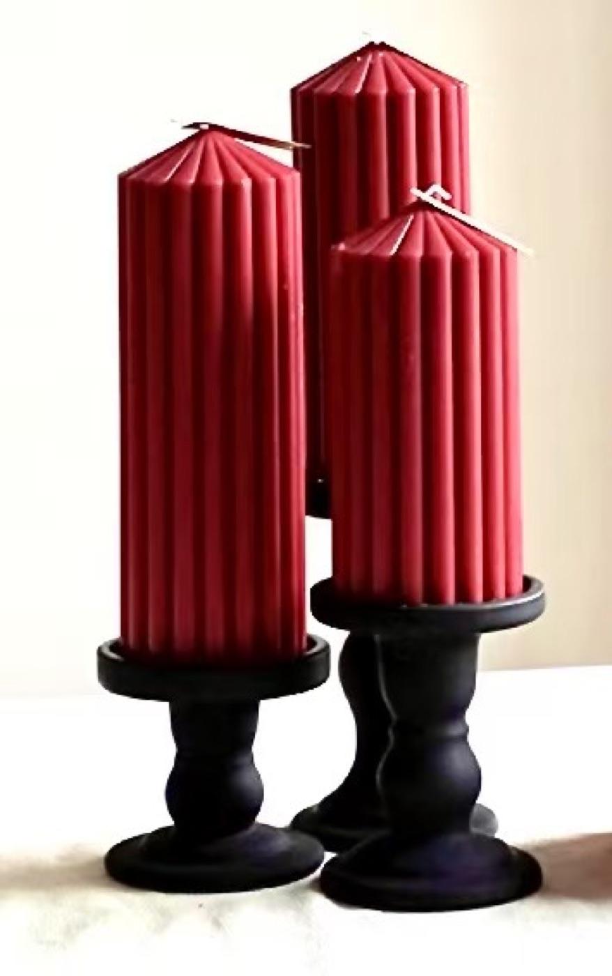 Polyresin candle holders with pillar candles