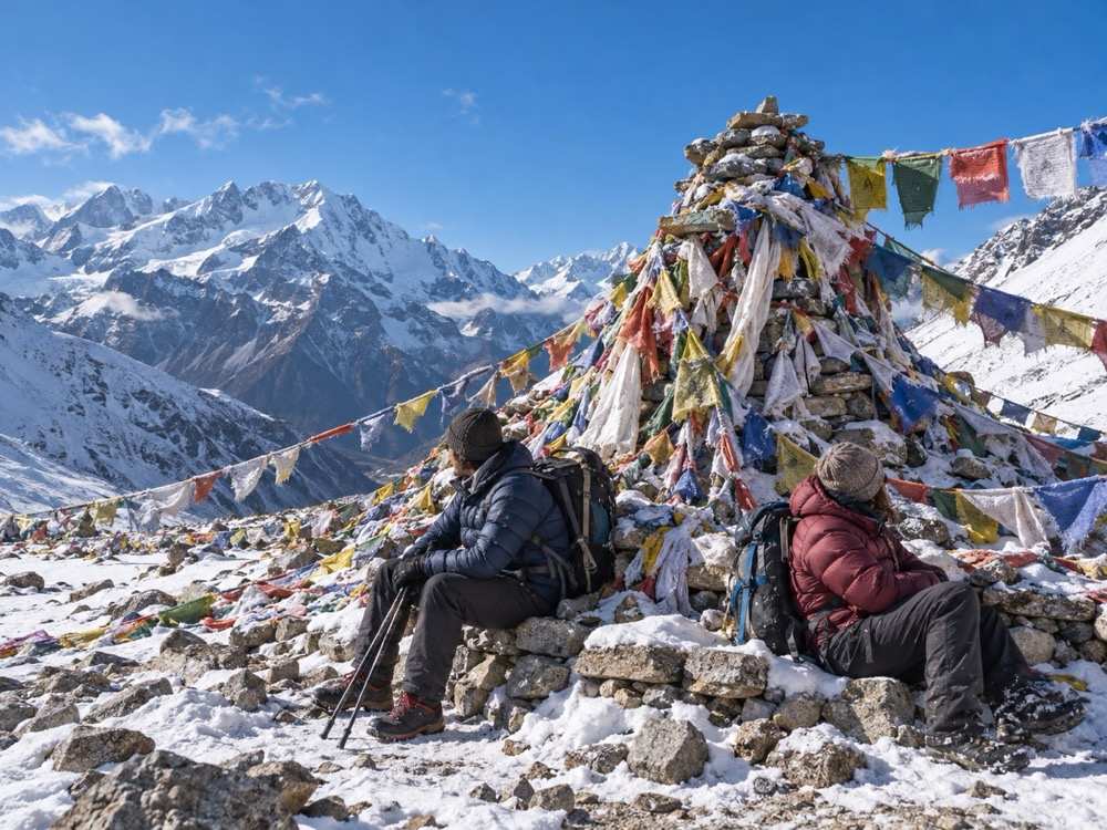 Porters on the stone trail above Lukla