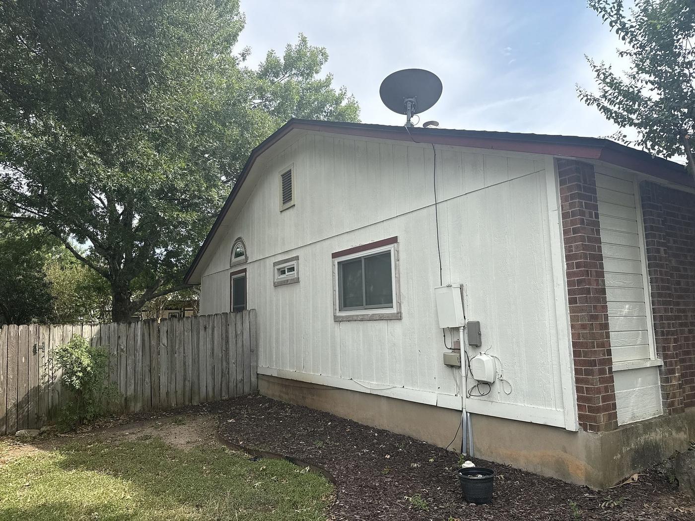 Before: Siding in Anderson Mill West, Cedar Park, TX