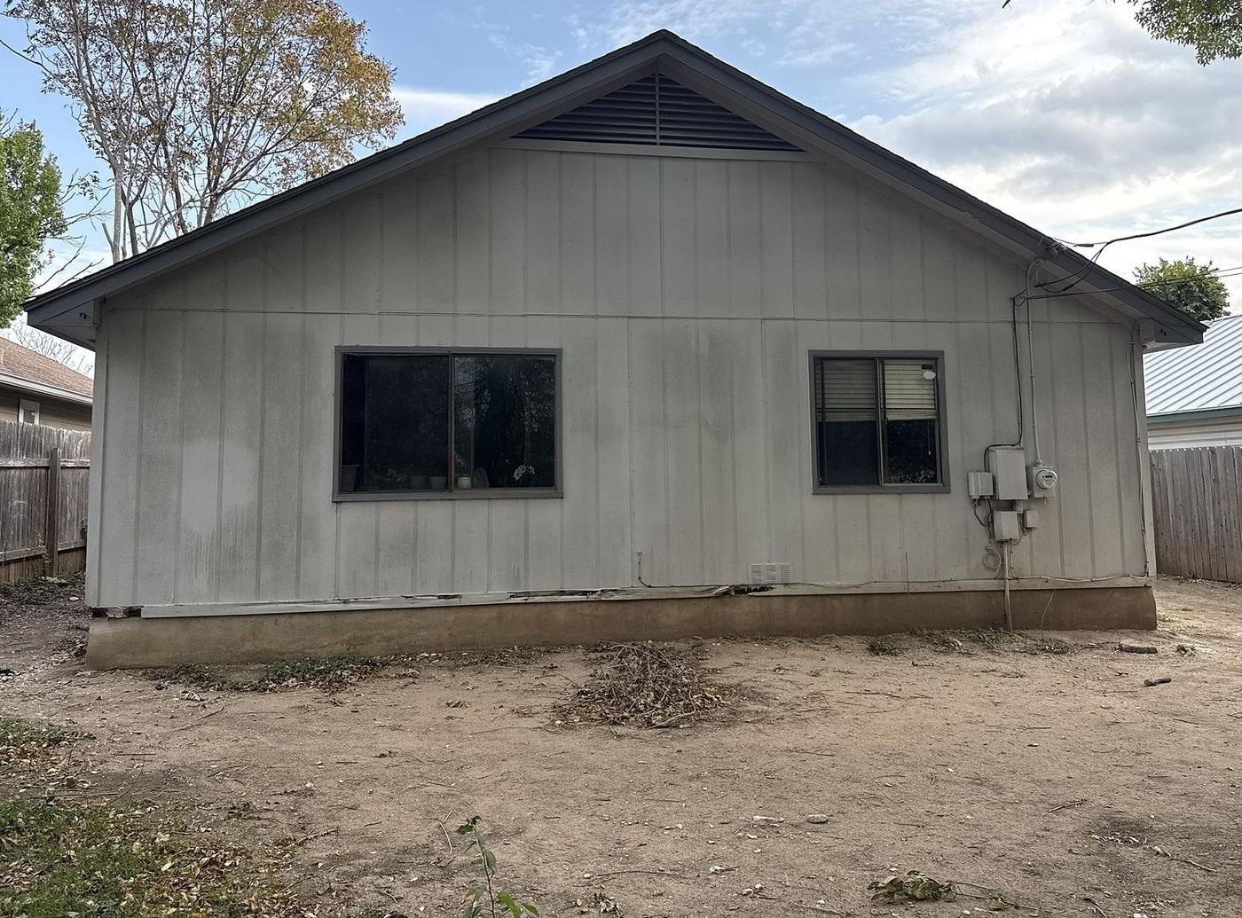 Before the siding & windows project — home exterior in North Star, Austin