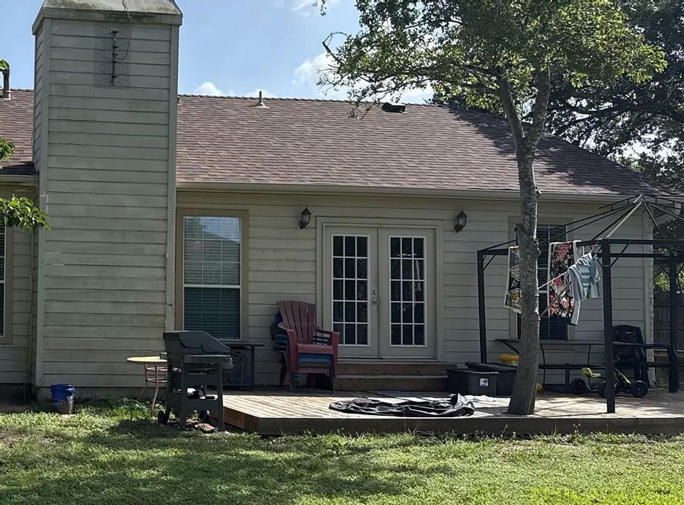 Before the siding & exterior painting project — home exterior in Block House Creek, Leander