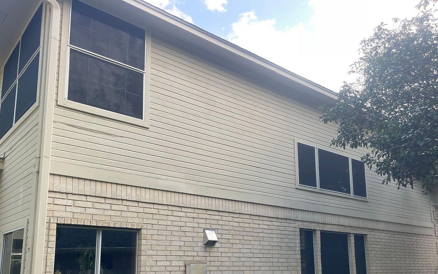 Before: Siding in The Oaklands, Round Rock, TX