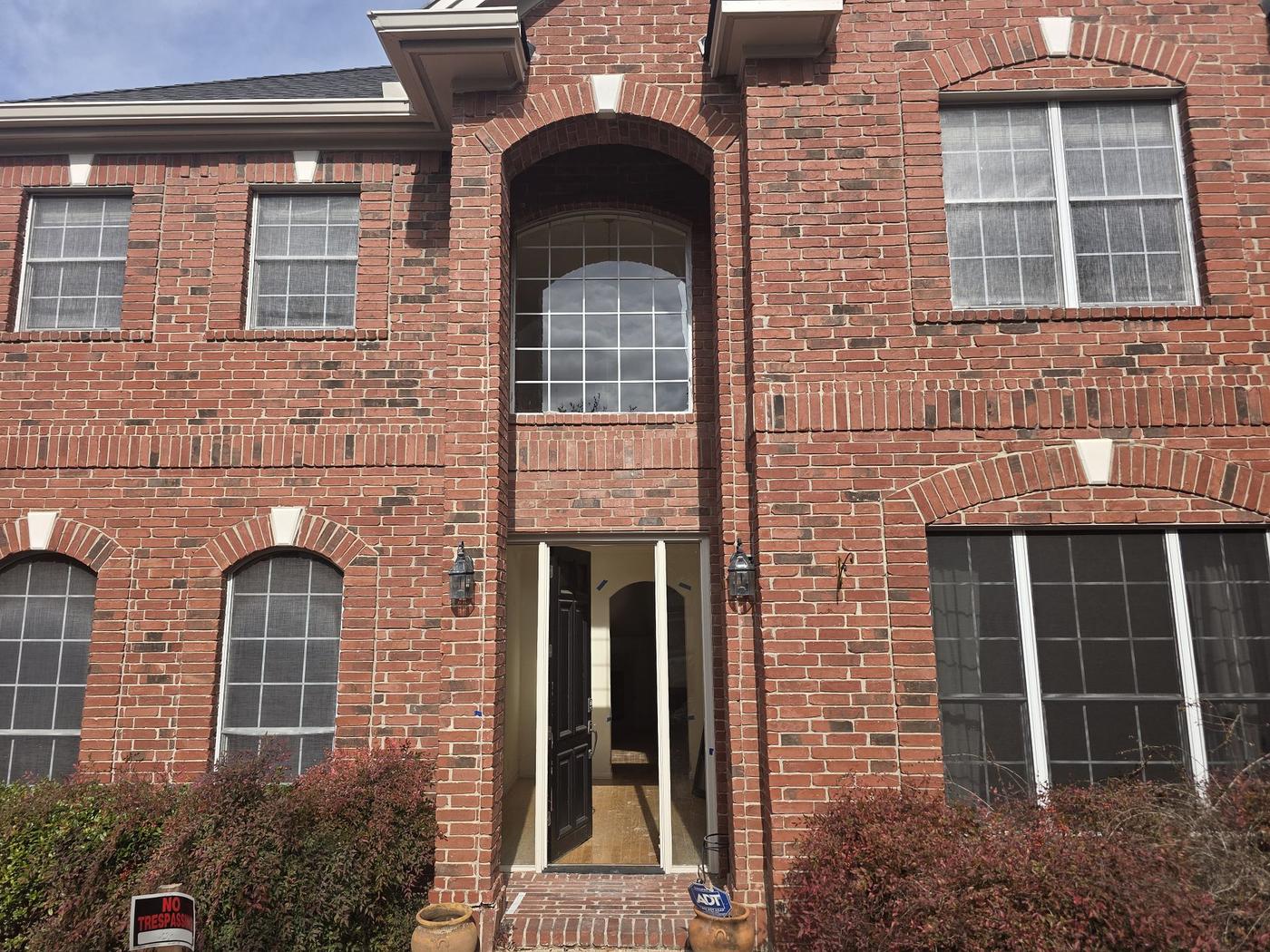 Before the windows project — home exterior in Sette Tierra, Austin