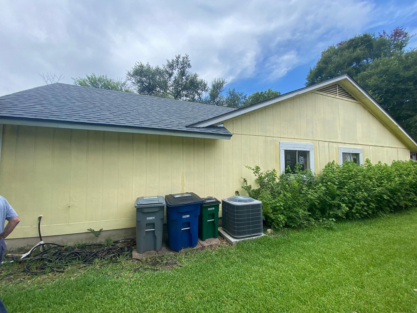 Before the siding & exterior painting project — home exterior in Cherry Creek, Austin