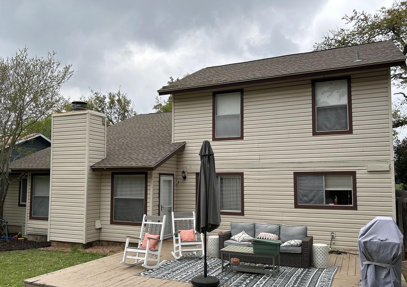 Before the siding & windows project — home exterior in Milwood, Austin