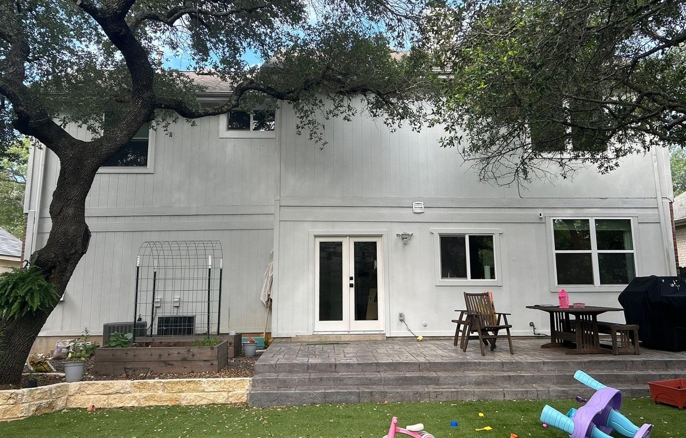 Before the siding project — home exterior in Circle C North, Austin