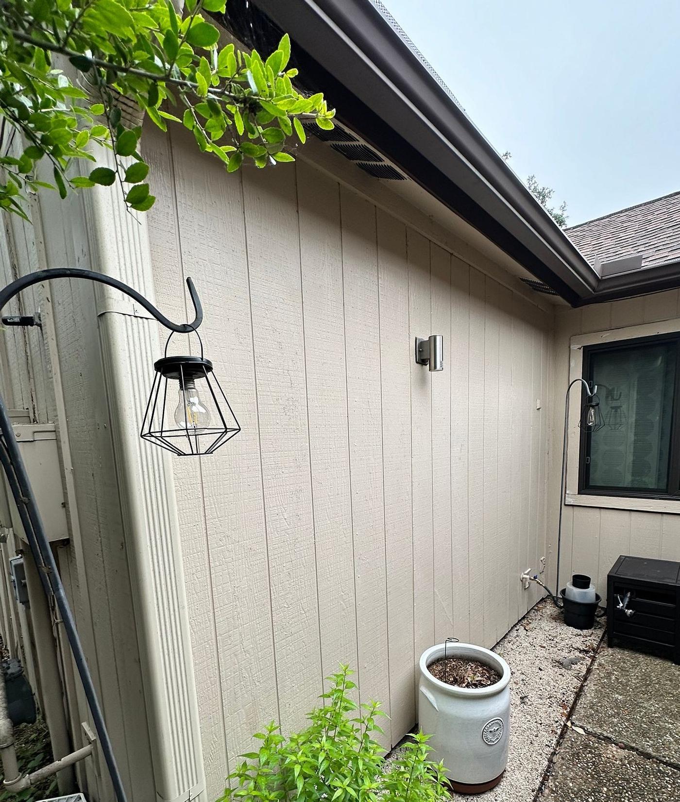Before the siding & doors project — home exterior in Adirondack, Austin