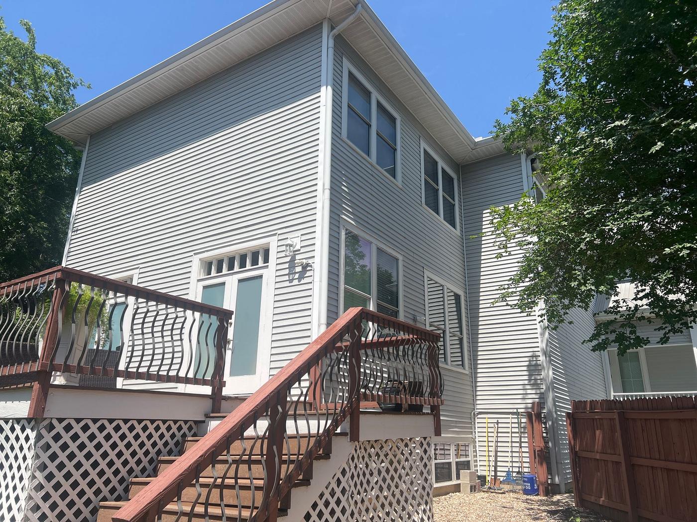 Before the siding & exterior painting project — home exterior in San Marcos