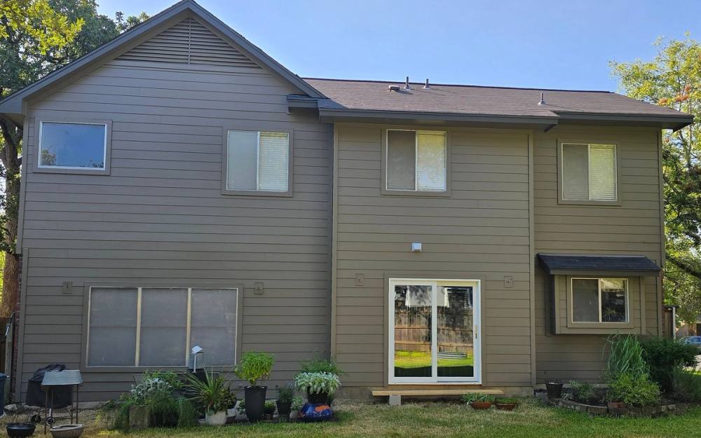 After: James Hardie siding & exterior painting completed in Village At Western Oaks, Austin