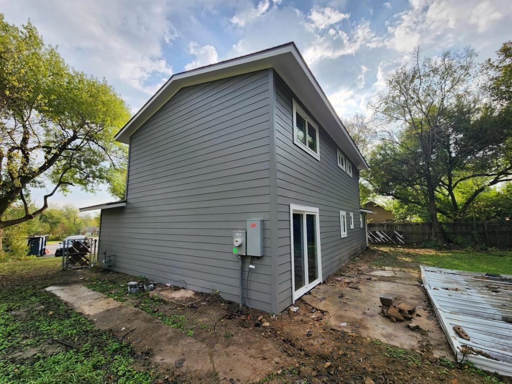 Siding project photo 1 of 7 — Cavalier Park, Austin, TX