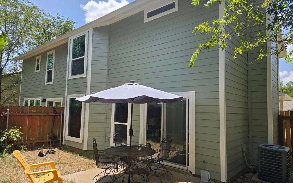 After: James Hardie siding & exterior painting completed in Tanglewood Forest, Austin