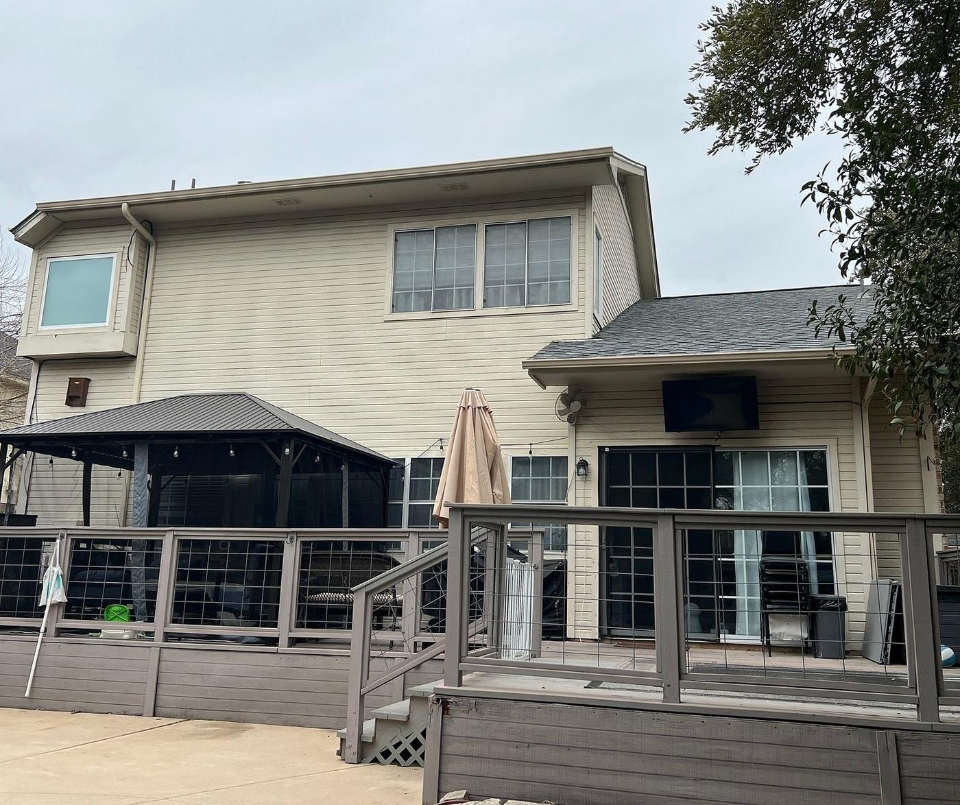 Before the siding & exterior painting project — home exterior in Woods Of Brushy Creek, Austin