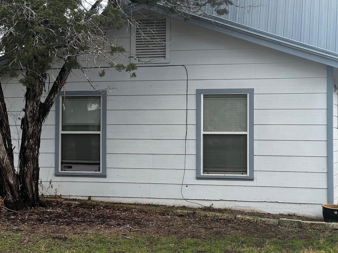 Before: Siding in Spicewood, TX
