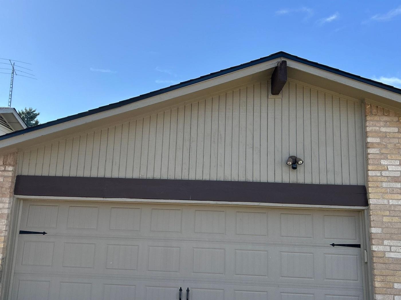 Before the siding & exterior painting project — home exterior in Village At Anderson Mill, Austin